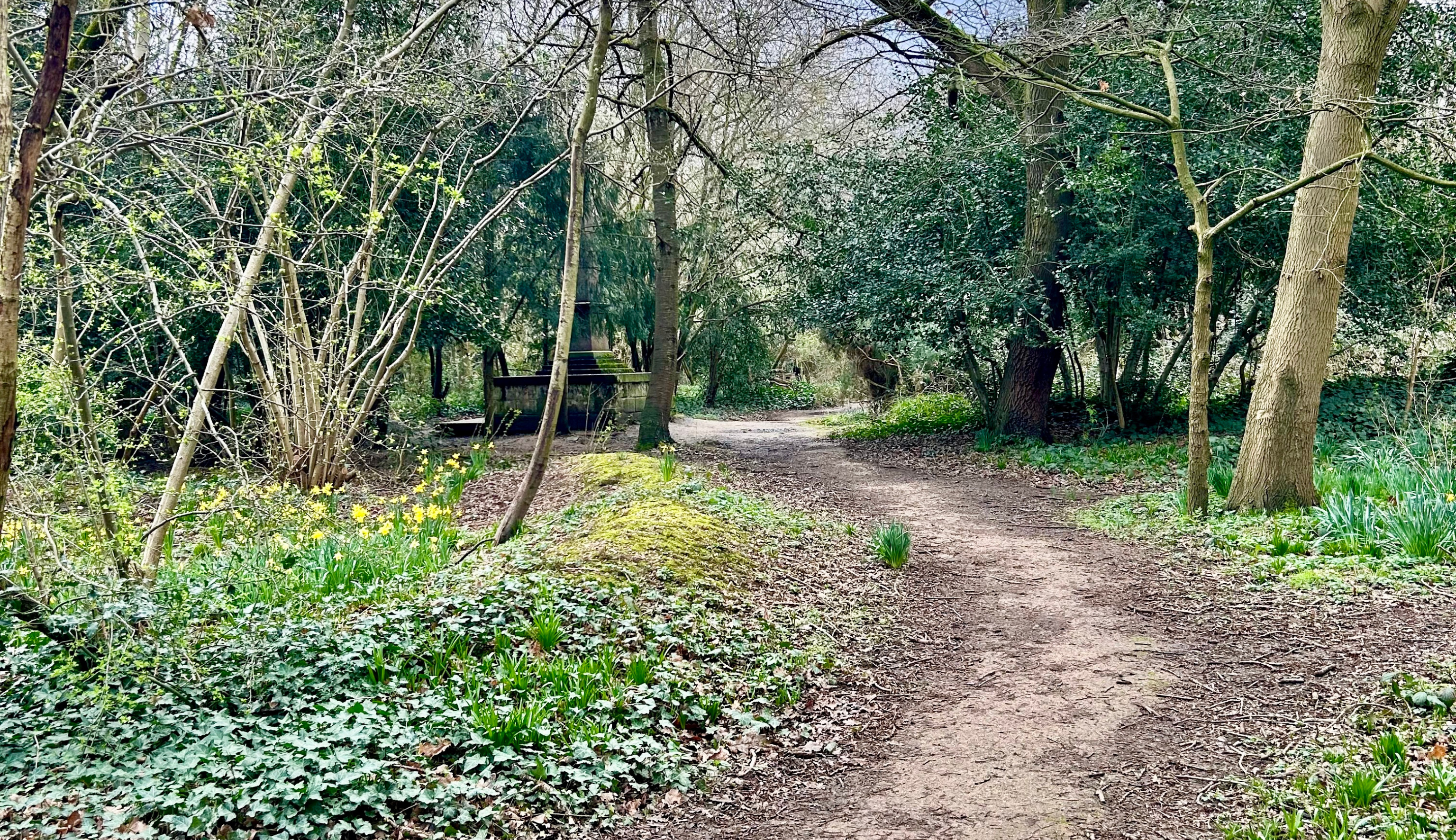 A walking path in Tower Hamlets Cemetery Park.